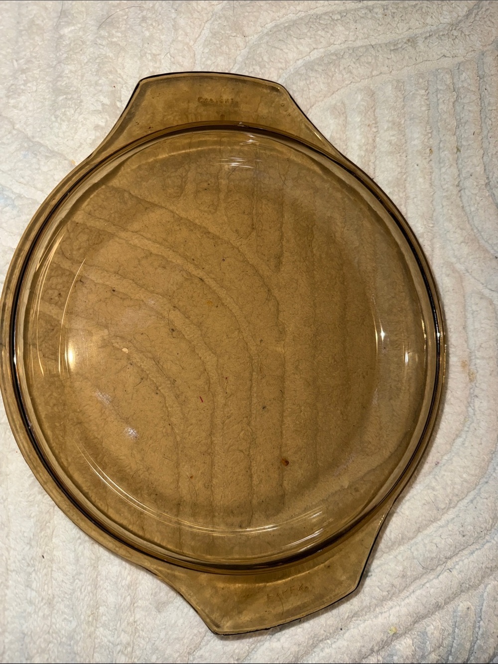 Pyrex smokey brown glass casserole lid.Design: tabbed "Cinderella" handles 183